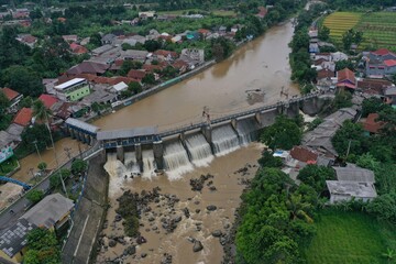 Aerial view of the Katulampa dam in Bogor, Indonesia during flood conditions