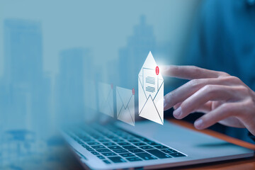 newsletter notification and open mail from the laptop. concept of correspondence, and news for...