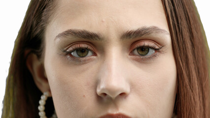 Fototapeta premium Woman's eyes, close-up, on a white background