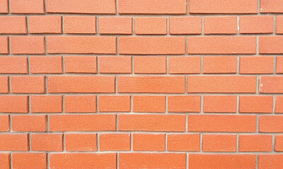 Fototapeta premium Classic brick wall background with a textured, rustic look. Perfect for urban, vintage, and industrial designs. Ideal for wallpapers, architectural backdrops, and creative projects.