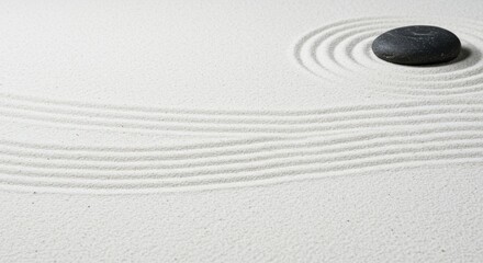 Serene Zen Garden with Black Stone Centered Amidst Raked White Sand Patterns