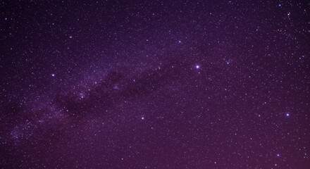 Obraz premium Starry night sky with vibrant purple hues, showcasing distant galaxies and celestial beauty