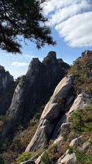 The magnificent scenery of rock mountains and clear autumn skies
