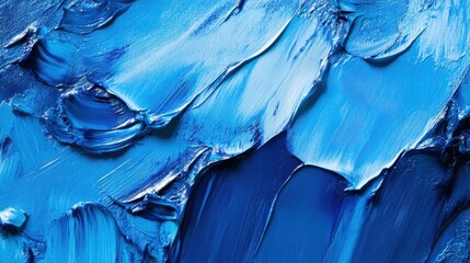 Close-up of vibrant blue oil paint, showcasing rich brushstrokes in an abstract, artistic detail.