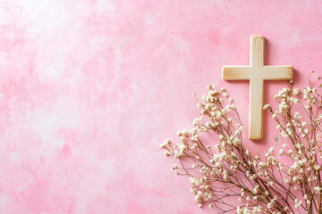 pink communion background with copy space with white flowers and rosary