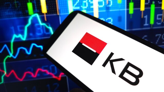 Konskie, Poland - March 03, 2025: Komercni banka company logo displayed on mobile phone