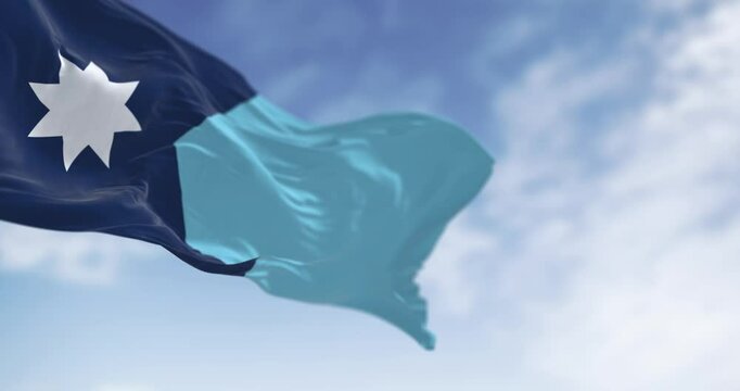 Close-up of Minnesota new state flag waving on a clear day
