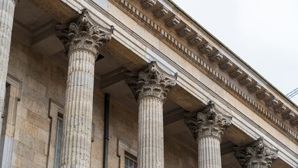 Corinthian columns with ornate capitals on a historic building