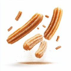 Crispy churros coated in cinnamon sugar, suspended in mid-air against a white background.