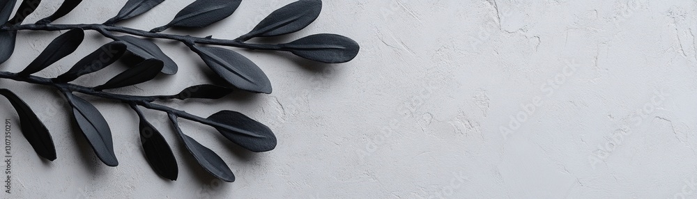 Poster soft-focus black leaf shadows interplay with a rough-textured concrete surface, creating a sophistic