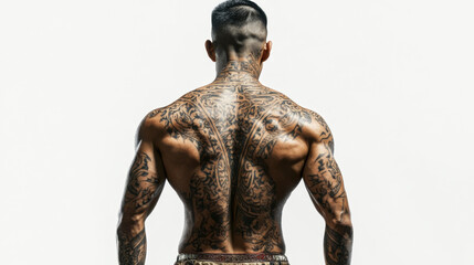 Fototapeta premium A Muay Thai warrior in historic Thai attire, his back completely covered in detailed tattoos