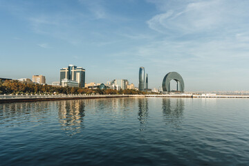 panoramic view of baku city bay with huge area with buildings reflection on water