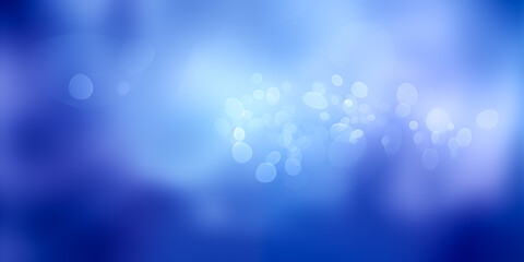 A captivating blue abstract background with soft bokeh effects for creative designs.