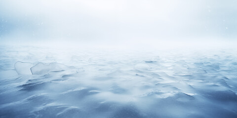 Obraz premium A serene and tranquil icy landscape with soft blue tones and a foggy atmosphere.