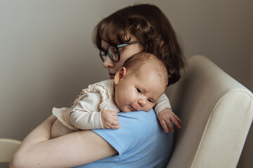 Young mother with newborn baby