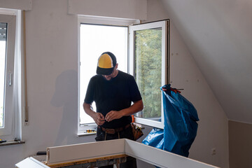 Carpenter Installing Door Frame in Home Renovation