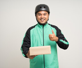 Young asian rider wearing green jacket uniform and bike helmet various action holding paper parcel box delivery to customer. Delivery man service worker Courier and shipping parcel cardboard service.