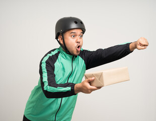 Young asian rider wearing green jacket uniform and bike helmet various action holding paper parcel box delivery to customer. Delivery man service worker Courier and shipping parcel cardboard service.