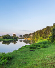 Fototapeta premium Beautiful, serene landscape with a river running through it