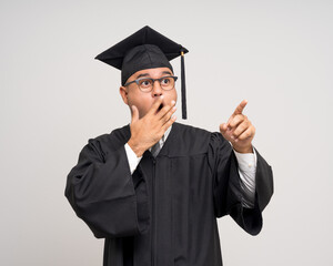 Various action. Happy Young Asian man in graduation costume with cap on isolated background....