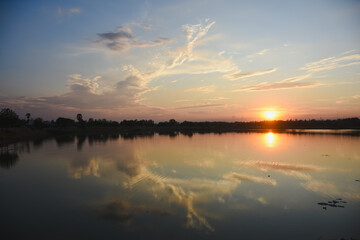 Orange sky with clouds at sunset