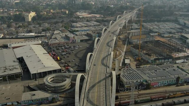 Aerial shot of Los Angeles. Sixth Street Viaduct bridge, busy industrial area, industry buildings