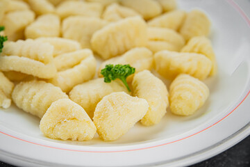 Gnocchi tasty fresh delicious gourmet food background table rustic food top view copy space keto and paleo diet vegetarian and vegan food