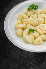 Gnocchi tasty fresh delicious gourmet food background table rustic food top view copy space keto and paleo diet vegetarian and vegan food