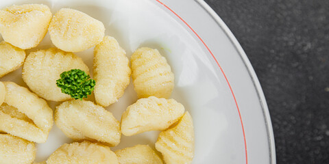 Gnocchi tasty fresh delicious gourmet food background table rustic food top view copy space keto and paleo diet vegetarian and vegan food
