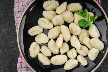 Gnocchi tasty fresh delicious gourmet food background table rustic food top view copy space keto and paleo diet vegetarian and vegan food