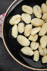 Gnocchi tasty fresh delicious gourmet food background table rustic food top view copy space keto and paleo diet vegetarian and vegan food