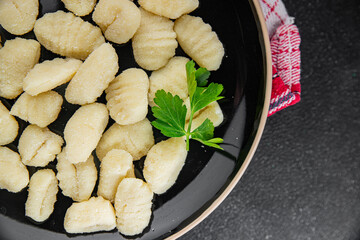 Gnocchi tasty fresh delicious gourmet food background table rustic food top view copy space keto and paleo diet vegetarian and vegan food