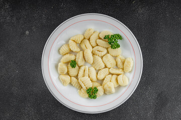 Gnocchi tasty fresh delicious gourmet food background table rustic food top view copy space keto and paleo diet vegetarian and vegan food
