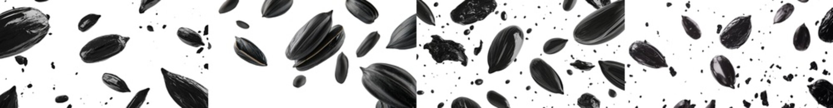 The image depicts a mound of black cumin seeds, captured from a top-down perspective on white