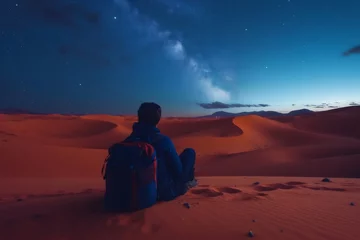 Fototapete Solo traveler admiring the milky way in the Sahara Desert at night, enjoying the silence and the immensity of the landscape © Татьяна Евдокимова