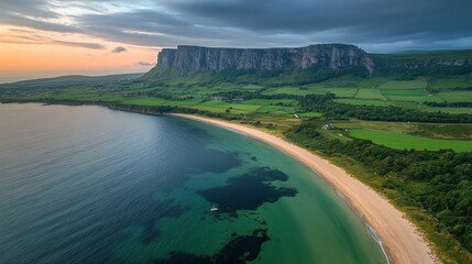 Fototapeta premium Coastal Cliff Sunrise, Scenic Bay, Aerial View