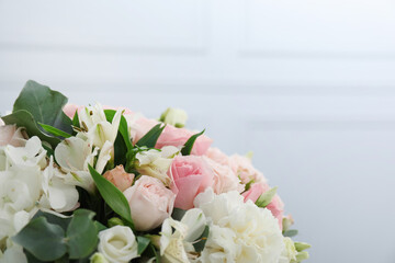 Beautiful bouquet on light background, closeup. Space for text