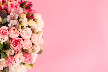 Bouquet of beautiful flowers on pink background, top view. Space for text