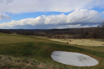 snow squall over golf course
