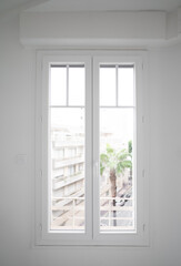 Plastic windows viewed from inside a room.