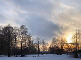 Winter sunset over the forest landscape near Ropka, Tartu, Tartumaa, Estonia, February 2021