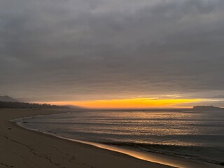 Sunset over the Atlantic Ocean beach and Forte da Ínsua fort near Caminha, Viana do Castelo, Portugal, January 2024