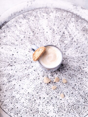 Cappuccino on bright background. Soft focus. Copy space.	