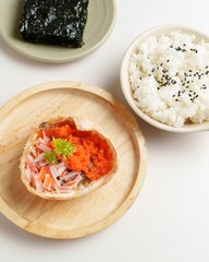 Colorful Japanese Cuisine with Crab, Rice, Seaweed on Wooden Plate