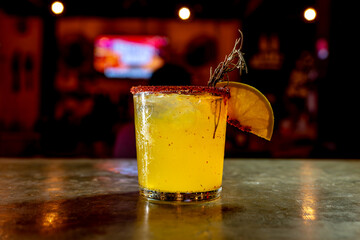 Refreshing Mezcal Cocktail with Spicy Rim at Bar Counter