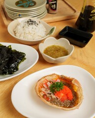 Fresh and Colorful Japanese Seafood Dish with Accompaniments