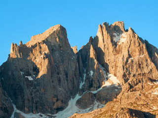 Aerial view beautiful Dolomite mountain Alps dawn range against blue sky on sunny day Italy. Top...
