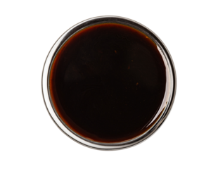 Small glass bowl with soy sauce or balsamic vinegar on white background