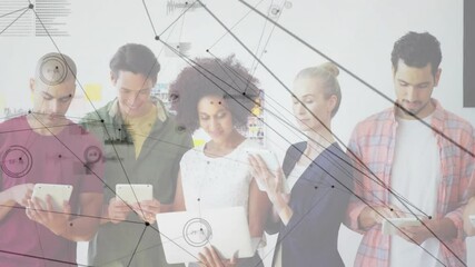 Using tablets, diverse group exploring digital network animation in school setting