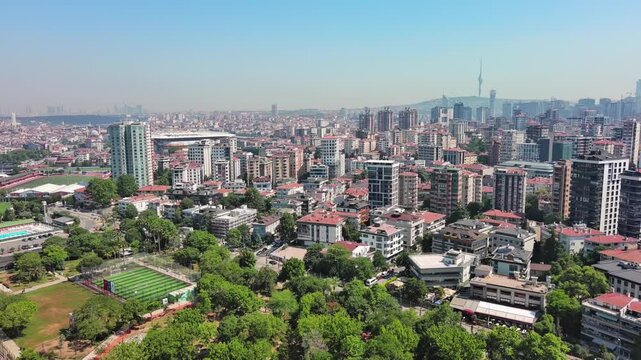 Istanbul, Turkey: Aerial view of famous Turkish city straddling Bosphorus Strait, summer day with clear blue sky - landscape panorama of Europe / Asia from above
